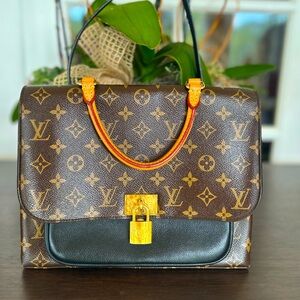 Louis Vuitton
Marignan Handbag Monogram Canvas with Leather $1600